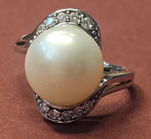 A Sterling Silver Pearl and Crystal Ring