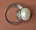 A Sterling Silver Pearl and Crystal Ring