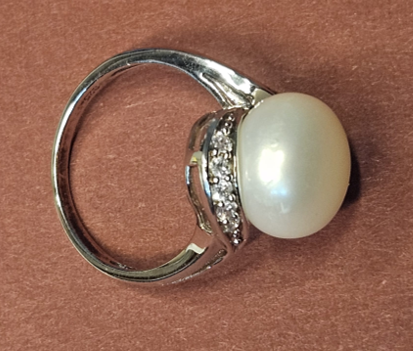 A Sterling Silver Pearl and Crystal Ring